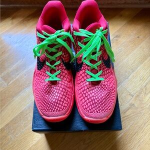 Nike Red Athletic Shoes with Green Laces